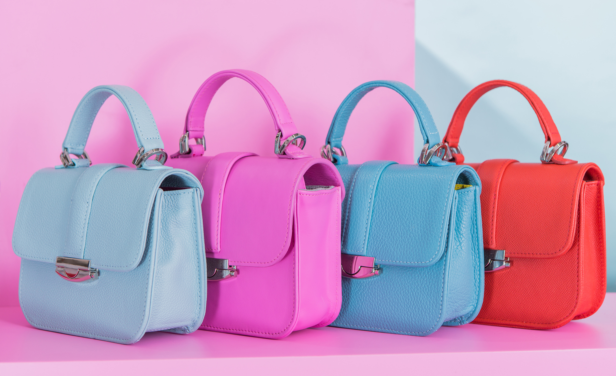 Fashion bags on the pink background